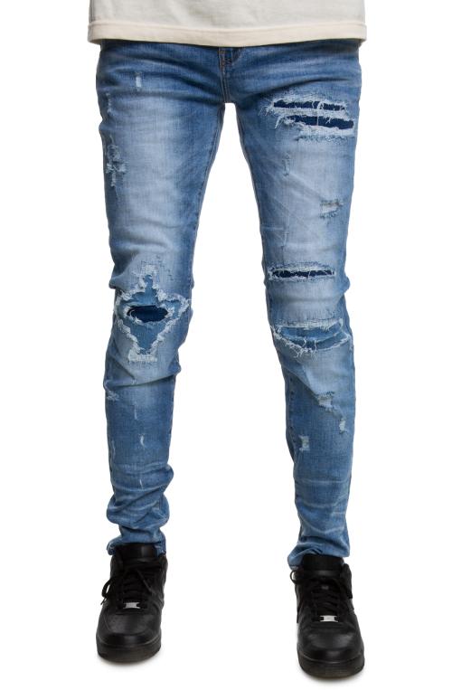 Vintage Ripped Sand Jeans in Medium Blue