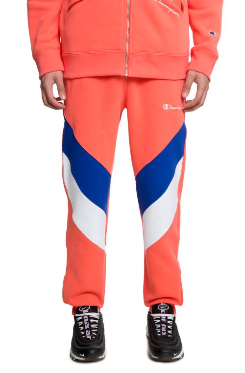 The Reverse Weave Colorblock Track Pant in Orange